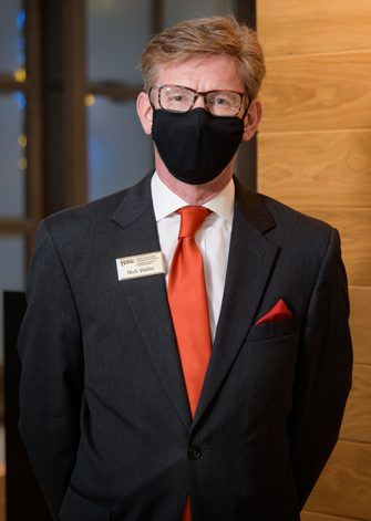 Nick Waller, an instructor with Hospitality Business Management and the Dining Room Manager for the Vita Nova restaurant. Photographed for a UDaily article about dining etiquette during COVID.