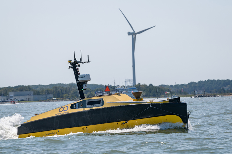 Researcher and professor of School of Marine Science and Policy Art Trembanis and his graduate student Grant Otto working with an Autonomous Surface Vehicle (ASV) from Ocean Infinity. The collaboration with Ocean Infinity (OI) will give UD researchers the opportunity to work with OI's autonomous vehicles while helping to make the vehicles smarter and more capable.