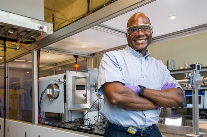 Thomas Epps has secured a patent on technology that holds potential to improve the performance, safety and stability of solid state lithium batteries, which are used in things like e-cigarettes, cell phones, the Samsung Galaxy note 7 and even auxiliary power units in the Boeing Dreamliner — all of which have experienced battery-related problems in recent years. The novel process employs tapered polymers that can be processed faster, cheaper and with less solvent waste, which makes it more environmentally friendly, too.  He uses the SAXS microscope with Priyanka Ketkar to examine the sensors. (Model Releases were obtained on anyone pictured.) 