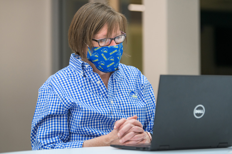 Ann Nann (gingham shirt), an academic advisor for Chemical Engineering in the College of Engineering, speaking with Katie DuBois, a UD class of 2021 undergraduate student on Zoom illustrating a. remote advising session. Photographed for an article in UDaily about academic advising at UD.