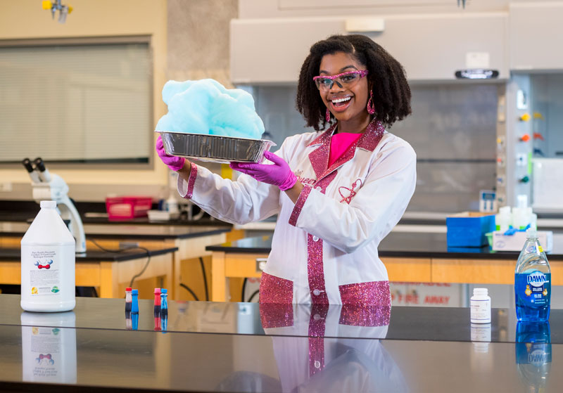 Jacqueline Means performing a fun science experiement