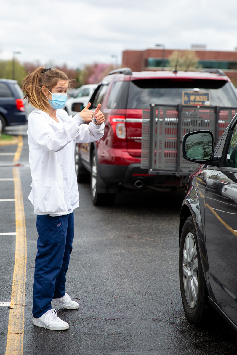 Senior UD nursing students assist with a drive-through COVID-19 vaccination event run by the Division of Developmental Disabilities Services and RiteAid. Pictured: senior nursing student Julianna Zomper 