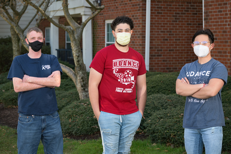 OCM-UDaily-UDance_Roomates-032921 From left: Colby Atkinson (Class of 2021, Business and Economics) and his roommates Zach Turner (Class of 2021, Health Sciences) and David Fu (Class of 2021, Public Policy and Administration) are all childhood cancer survivors who are now working with UDance. Colby was a B+ hero for 2 years with the UD baseball team. He became very active with UDance while a student as the Family Liaison Chairperson on the UDance Executive Board. Colby first met David at Kay's Kamp, a week-long camp experience for children with cancer and those in remission, and Zach while at UD.