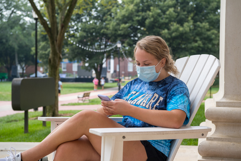 Students & faculty welcome back a new Fall 2021 semester as they hurry to classes for the start of classes. Mikaela Ferrara, a freshman university studies major from West Deptford, NJ waits on the steps of Gore Hall before her next class. 