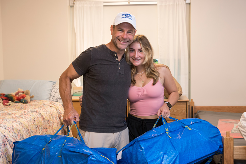 1743 Welcome Days - Move-In - 08.26.21 1743 Welcome Days move-in for freshman at Reeding and Gilbert Halls as well as the Harrington Quad. Michael Chajes, Dean of the Honors College was on hand to walk around and introduce himself to the students. (Pictured is Rachel Gaebel and her dad setting up her room.)
