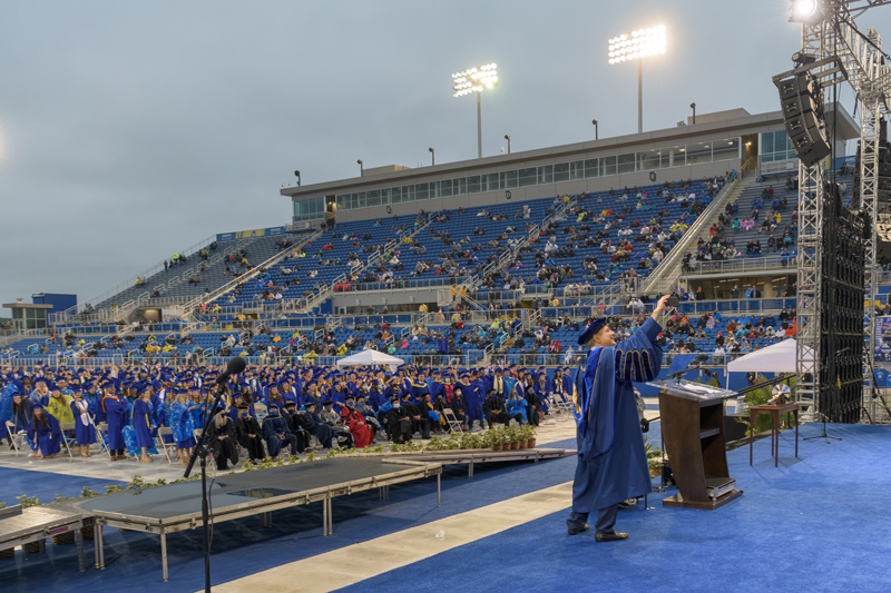UD President Dennis Assanis captures the moment with hundreds of 2021 graduates during UD Commencement ceremonies.