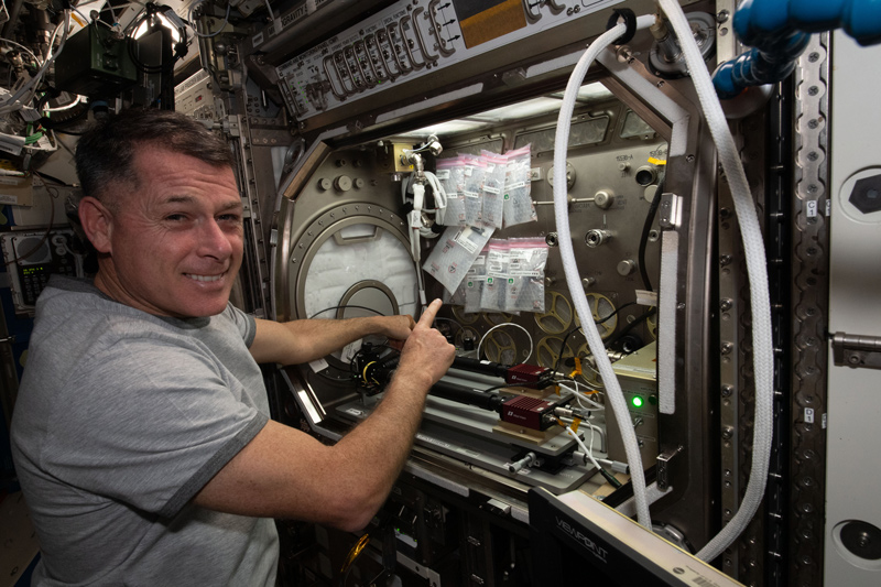 iss065e148265 (June 28, 2021) --- NASA astronaut and Expedition 65 Flight Engineer Shane Kimbrough sets up the Microgravity Science Glovebox for the InSpace-4 physics study that will explore advanced materials and manufacturing techniques.