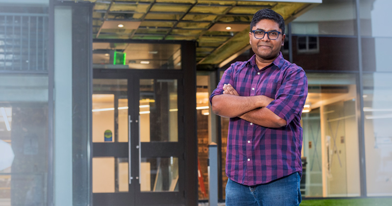 Aditya Dutta and his team have identified the Arabidopsis SDA1 gene and a novel amino acid domain (SWAD) as key mediators of both biotic (eg: bacterial pathogens) and abiotic stress (eg: temperature, drought, salinity).  Here he is in front of what will be his new lab in Worrilow Hall.  (Professor Dutta will send us some relevant photos of research done in his lab.)