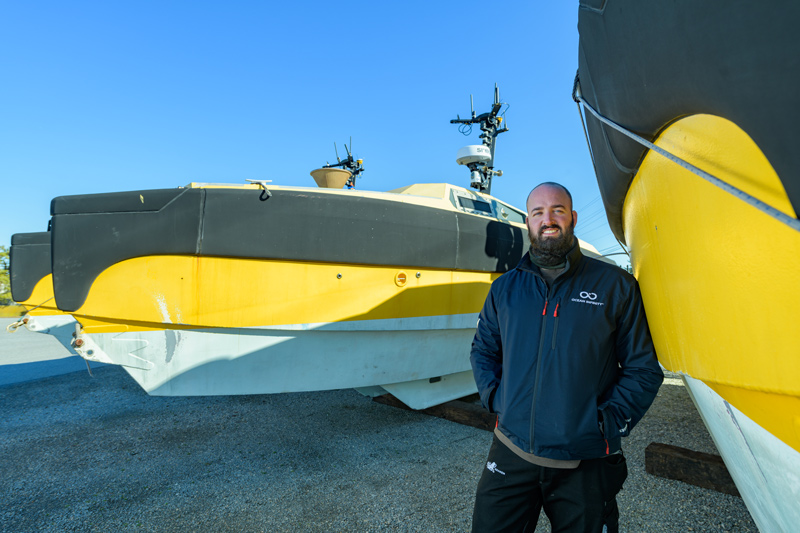 Bryan Keller is an AUV / USV (Autonomous Underwater Vehicle / Unmanned Surface Vehicle) Operator at Ocean Infinity who’s a 2011 graduate of UD’s Master’s in Oceanography degree program. Having worked with autonomous vehicles while studying at UD, he’s now back on the Lewes Campus working for Ocean Infinity, which has partnered with UD. The partnership will enable “a multidisciplinary group of UD students and faculty members the opportunity to get hands-on experience with the latest technology in the unmanned underwater and surface vehicle fields, as well as access to scores of deep-sea datasets” [UDaily]