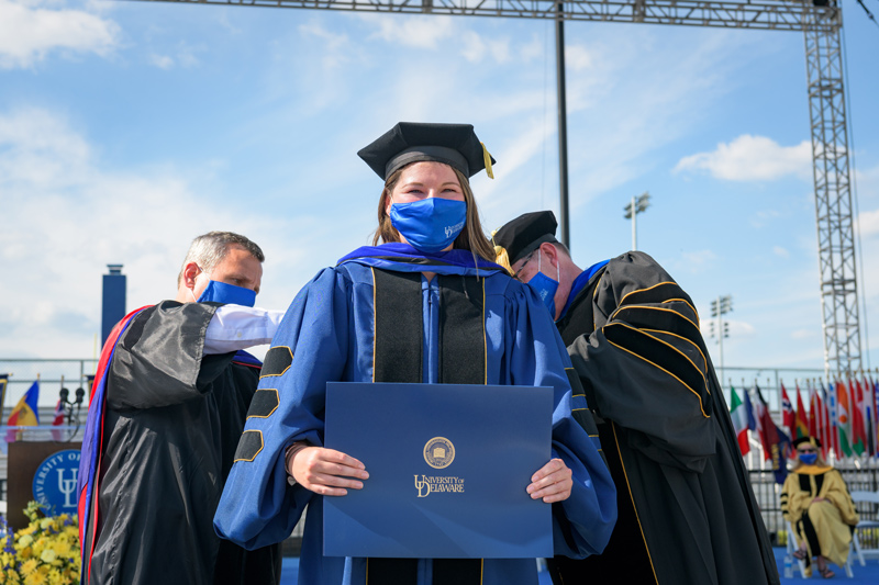 Hooding ceremony for 2020 and 2021 Doctoral Candidates, held on May 27th, 2021 in Delaware Stadium under the direction of UD President Dennis Assanis and Lou Rossi, Dean of the Graduate College and Vice Provost for Graduate and Professional Education.