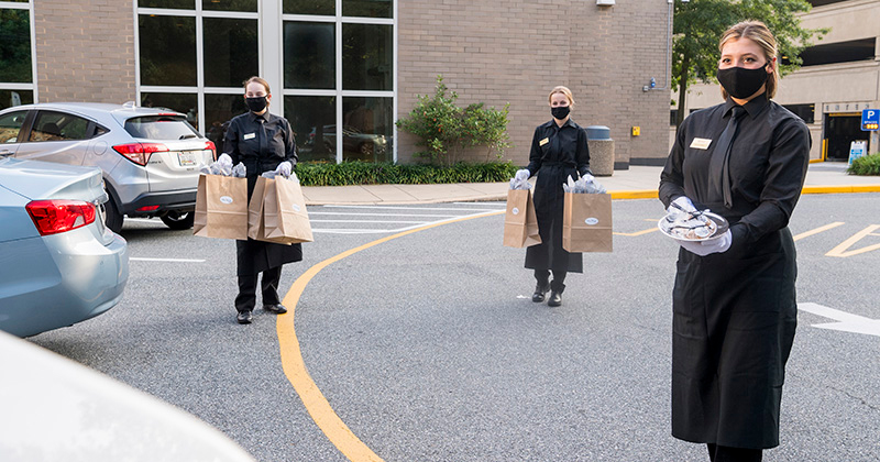 Vita Nova is now offering To Go items in leu of indoor dining during these COVID times.  The To Go Lunch Menu is M-F from 11:30-1 pm and the Dinner Menu is available on W-F 5:30-8 pm.  Students still prepare the lunches & dinners and take the food items to their cars in the side lot for delivery.  