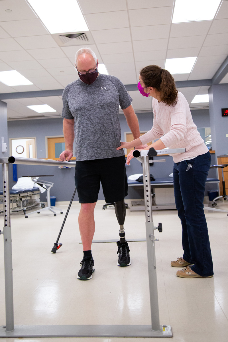 Glenn Runyon works with Sarah Smith in the UD Physical Therapy Clinic. Glenn underwent osseointegration, which involves a metal rod being inserted into the a bone in place of wearing a socket. This is a fairly rare procedure - less than 200 of these type of surgeries in the U.S. Runyon is a history teacher and football coach for Concord High School.

Glenn also works with John Horne of Independence Prosthetics & Orthotics