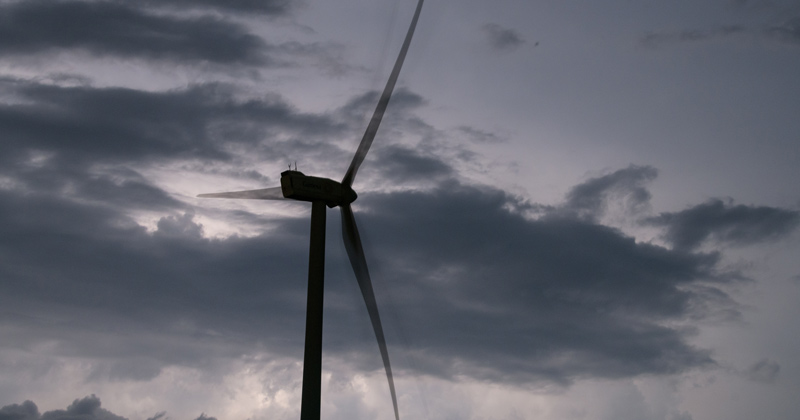 The wind turbine on the University of Delaware Hugh R. Sharp Campus in Lewes, DE before and during a summer evening thunderstorm.