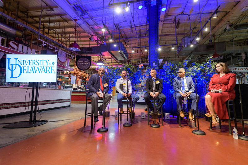 A panel of UD experts discuss the pandemic’s impact on the hospitality industry. Pictured from left to right: Moderator Srikanth Beldona; Class of 2000 graduates Craig Mosmen and Michael Cassano, co-owners of the Couch Tomato restaurant group; Allan Fernandes, vice president for global safety and risk solutions at Aramark, Class of 1992; ​​and Lydia Jeffress, group sales manager for the Four Seasons Hotel Philadelphia. 