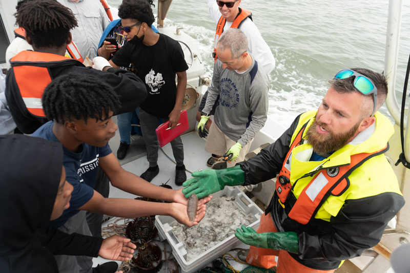 The students went out on the Research Vessel Joanne Daiber where they participated in a trawl and looked at water quality at several sites. Chris Petrone, Extension Director of Marine Education for Delaware Sea Grant (DESG), and Ed Hale, DESG fisheries and aquaculture specialist and assistant professor in UD’s School of Marine Science and Policy, taught the Green Jobs students about horseshoe crabs and other marine life. 