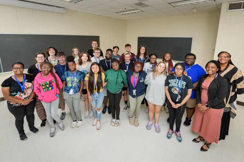 The high school students gather with Talley Middle School Assistant Principal Eryn Smith (first row, far right) and Louis L. Redding Middle School Principal Leah Anderson (second row, far right). Throughout their two weeks together, the students learned about each other, themselves and what awaits them as future educators. 