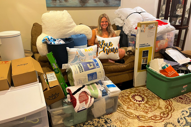 Incoming first-year student Meghan Barna packs necessities, school supplies and sentimental items as she prepares to move into a residence hall on Saturday, Aug. 27.