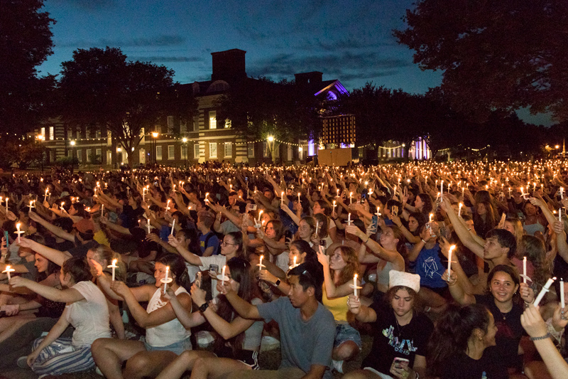 Blue Hens gather on The Green for the University of Delaware’s Twilight Induction Ceremony, a ritual that welcomes to campus all new students and marks the official start of their time as UD students.