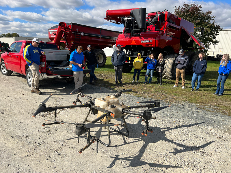 Hoober’s staff demonstrates a $25,000 drone equipped to spray crops. An alternative to a traditional crop duster airplane, the drone can apply needed crop protection chemicals at a low altitude to control plant diseases and insects, reducing drift. Hoober’s staff demonstrates a $25,000 drone equipped to spray crops. An alternative to a traditional crop duster airplane, the drone can apply needed crop protection chemicals at a low altitude to control plant diseases and insects, reducing drift.
