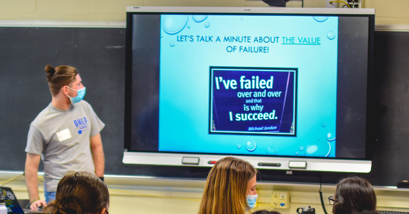 Sophomore peer mentor Brian Chansky leads a Blue Hen Leadership Program presentation on finding success through failure for Red Clay students.