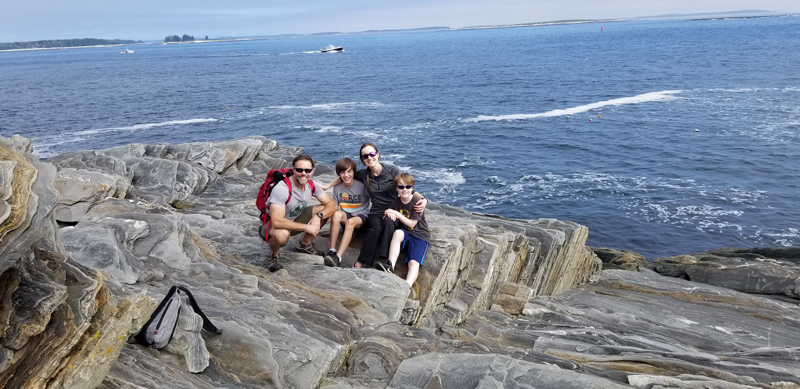 The Willard family paused to catch their breath after a hike through the La Verna Preserve in Bristol, Maine, which features 3,600 feet of rocky ocean shoreline.