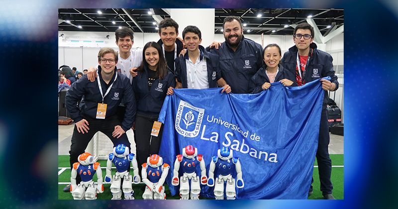 Andres Ramirez-Jaime (far left) poses with his teammates from the University of La Sabana (from left to right) Omar Sanchez, Valentina Diaz, Nestor Porras, Andres Coronado, Julian Echeverry, Jenny Robayo and Juan Cuevas after placing second at the world RoboCup in Australia in 2019. Andres Ramirez-Jaime (far left) poses with his teammates from the University of La Sabana (from left to right) Omar Sanchez, Valentina Diaz, Nestor Porras, Andres Coronado, Julian Echeverry, Jenny Robayo and Juan Cuevas after placing second at the world RoboCup in Australia in 2019.