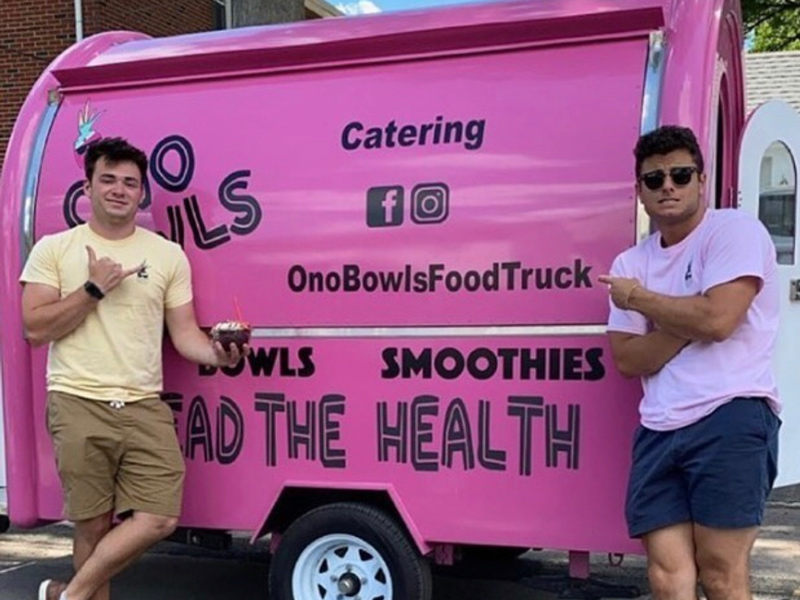 UD student Ben Quinutolo (left) and his business partner Chris Giuditta stand next to the original Ono Bowls Food Truck. UD student Ben Quinutolo (left) and his business partner Chris Giuditta stand next to the original Ono Bowls Food Truck.