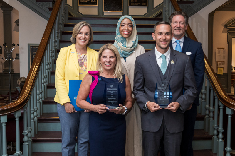 House Majority Leader Valerie Longhurst and Representative Michael Smith (front row), are recognized by the University of Delaware with the inaugural Biden School Civility in Public Service Award, which is supported by the Stavros Niarchos Foundation (SNF) Ithaca Initiative. They are pictured with (back row, left to right) Anne Slease, director of advocacy and education for the Delaware chapter of the National Alliance on Mental Illness; Representative Madinah Wilson-Anton, academic affairs and external relations manager for UD’s Biden Institute; and Chris Locke, founder of Sean’s House, a mental health safe haven for young adults.