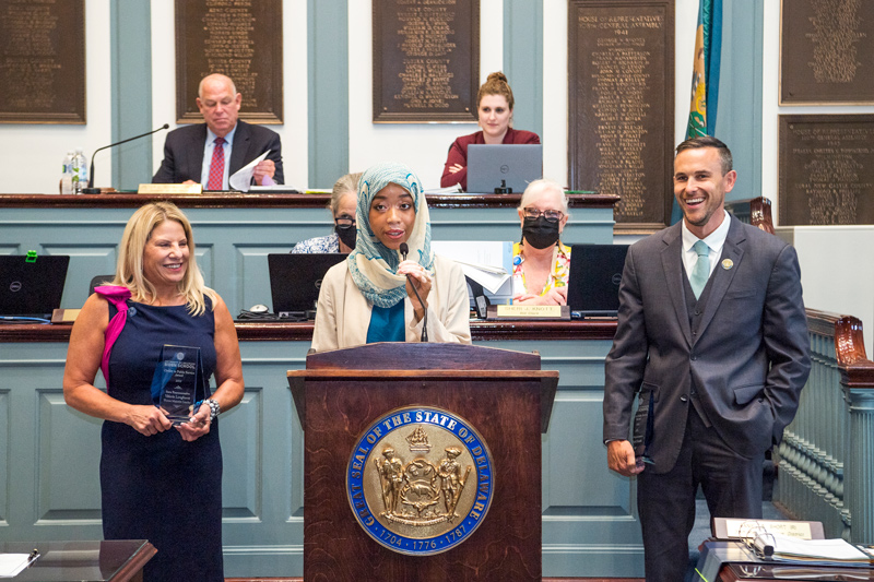 Delaware Representative Madinah Wilson-Anton, who also serves as academic affairs and external relations manager for the University of Delaware’s Biden Institute, presents the Biden School Civility in Public Service Award, supported by the Stavros Niarchos Foundation (SNF) Ithaca Initiative, to House Majority Leader Valerie Longhurst and Representative Michael Smith.