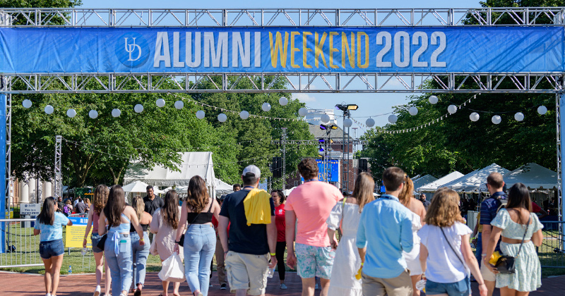 Blue Hens enter The Green for Dela-Fest, the signature event of Alumni Weekend.