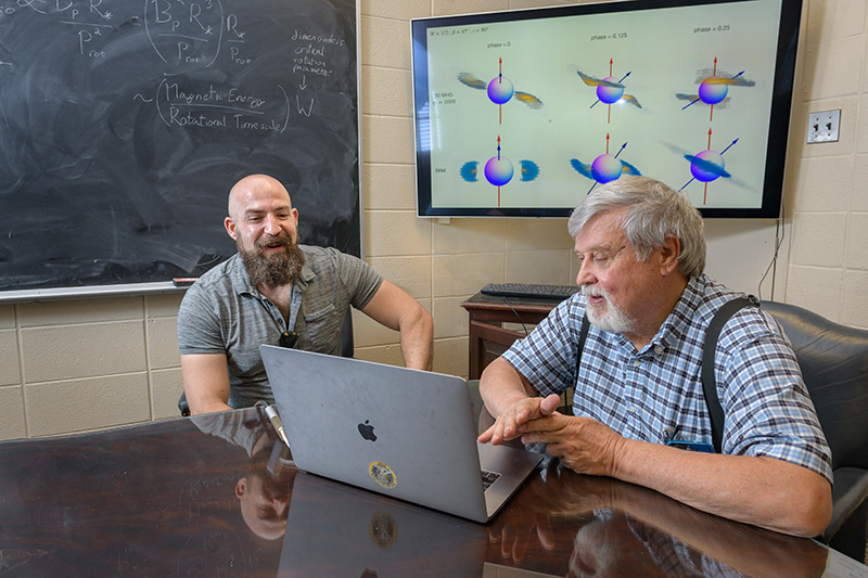 New discoveries about magnetic massive stars have emerged as astronomer Matt Shultz (left), the Annie Jump Cannon Postdoctoral Fellow at the University of Delaware, and theoretical physicist Stan Owocki, professor of physics and astronomy, combined forces with other collaborators. Shultz was among those who found that the star’s magnetic field strength and its rotation speed are closely related, and Owocki and his team showed how the energy for these stars’ radio emissions was probably generated.