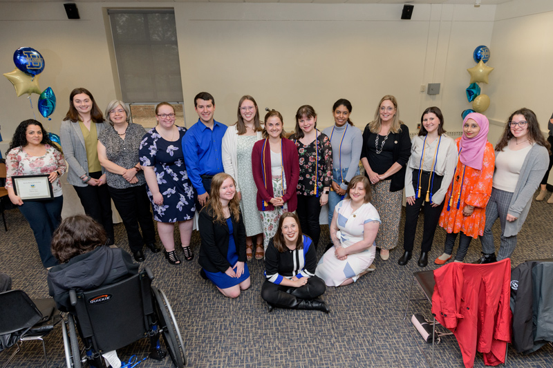 Several students are inducted into the Delta Alpha Pi (DAPi) Honor Society, which is open to undergraduate and graduate students with disabilities.