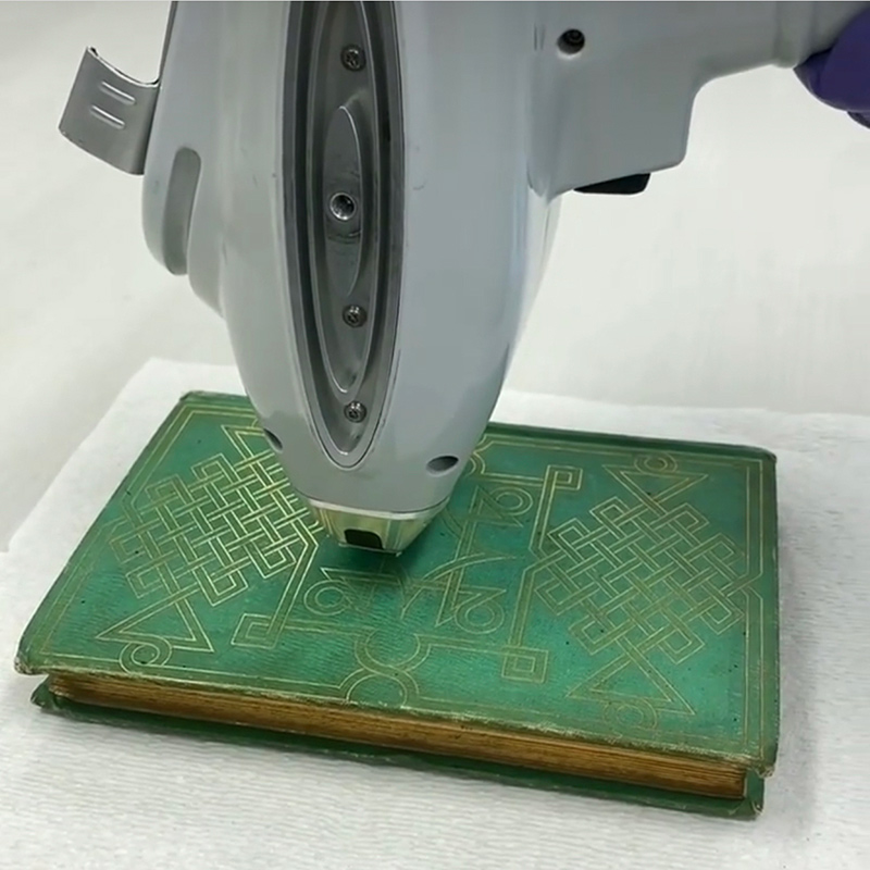 Using XRF to analyze the elements present in a book cover from the mid-1800s.