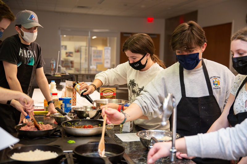 Students prepare meals in the demo kitchen the week of St. Patrick’s Day. Each week, in Cooking Around the World with adjunct instructor Brittany Knick, students explore recipes from a new country. Food can help bridge gaps between people from different countries, regions and cultures of the world. On another level, if nutritionists and other healthcare providers are aware of the differences, they can tailor programs to help patients eat a healthier diet.