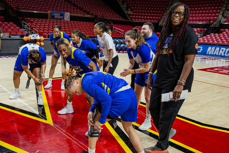 University of Delaware women’s basketball coach Natasha Adair enjoys the moment as her team prepares for a practice on Thursday, March 17, at the Xfinity Center in College Park, Maryland. The Blue Hens will play Maryland in the first round of the NCAA Tournament on Friday, March 18.