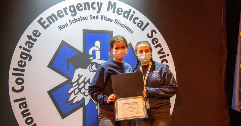 Abigail Quinn and Sarah Winiker with UD's College EMS Organization of the Year award