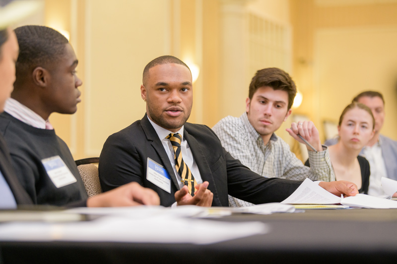 SNF Ithaca National Student Dialogue participants ask questions and collaborate during breakout session assignments.