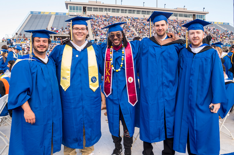 From left to right, Daniel Julis (psychology), Luke Biddle (biology), Christopher Howell (human services), Matt Lax (finance) and Kyle McDonald (communications) attend Commencement on Saturday, May 28. From left to right, Daniel Julis (psychology), Luke Biddle (biology), Christopher Howell (human services), Matt Lax (finance) and Kyle McDonald (communications) attend Commencement on Saturday, May 28.