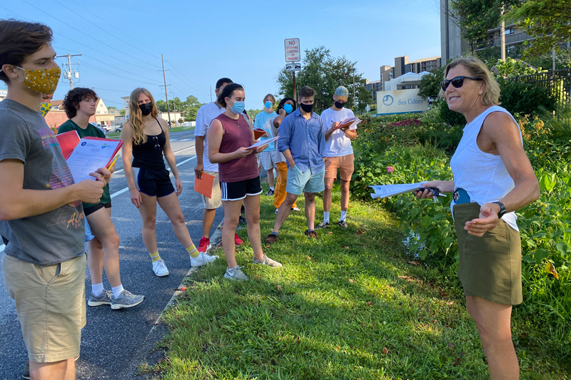 Sue Barton explains the benefits of a bioswale installation in South Bethany to landscape architecture majors.