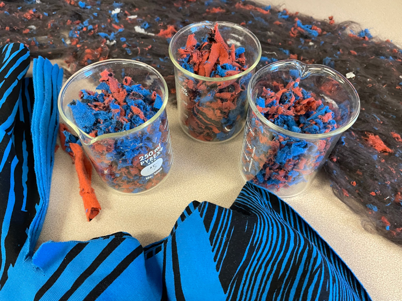 The shredding process turns leftover waste fabric into tiny, multicolored pieces called “shoddy.” The shredding process turns leftover waste fabric into tiny, multicolored pieces called “shoddy.”