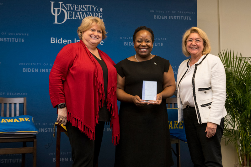 Desa Burton (center), the executive director of the nonprofit coding school Zip Code Wilmington, was honored with the Biden Institute’s 2022 Woman of Power and Purpose Award. She is pictured with Institute executive director Cathy McLaughlin (left) and UD First Lady Eleni Assanis.