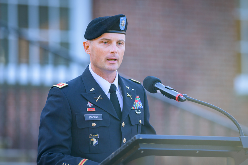 At a Veterans Day ceremony on The Green, Lt. Col. Gary Goodman encourages UD community members to ask veterans about their service. “Those couple of minutes of interaction — of connection — will demonstrate an appreciation for that veteran far in excess of what a handshake and a thank you can provide,” he says.