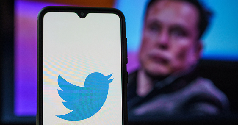 Photo of Elon Musk and the Twitter symbol Elon Musk wanted to buy Twitter, then he didn’t and now he wants it again. The deal had a bidder termination provision which would have cost him big. A Lerner College professor digs into these deals.