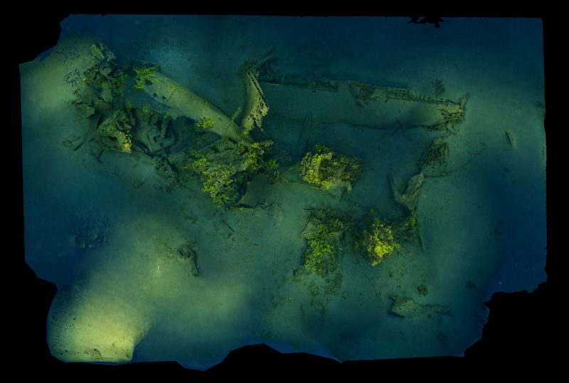 Data and photographs taken of the underwater wreck site were used to create this photomosaic of a missing B-24 bomber. Note the propeller in the center. 