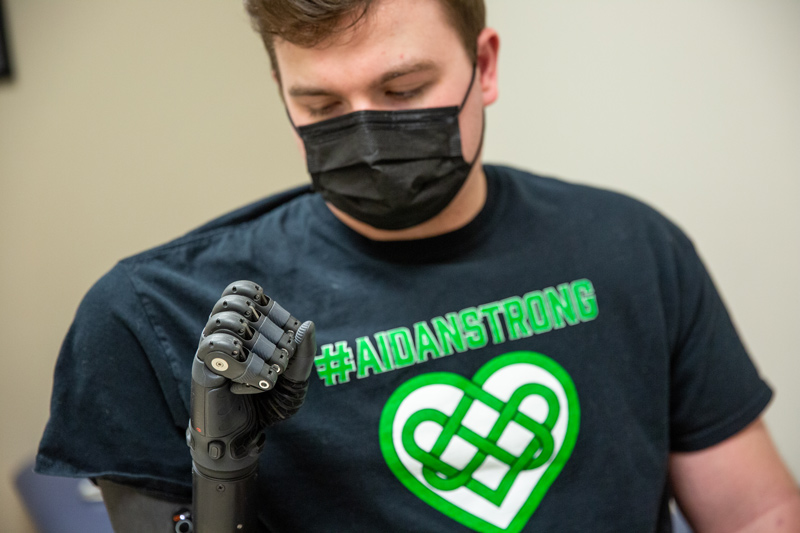 University of Delaware graduate Aidan Bradley (Lerner, Class of 2022) has been outfitted with a bionic arm that will give him use of a second hand.
