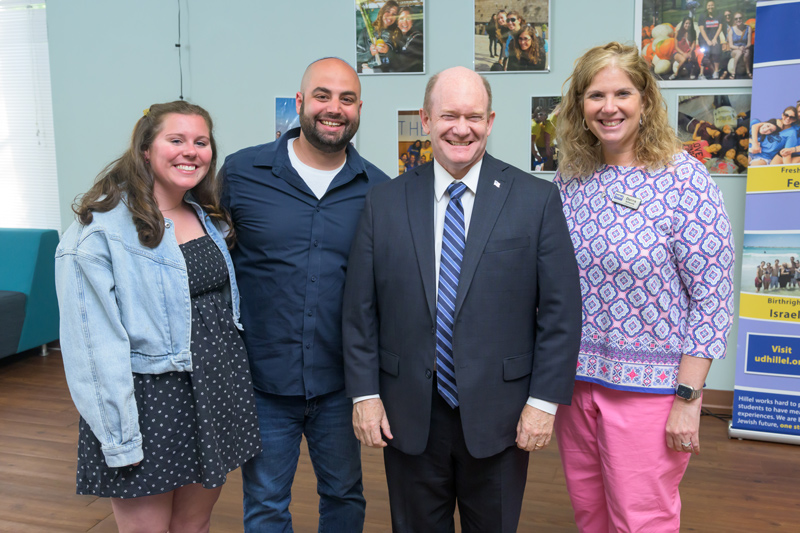 The event was sponsored by UD Hillel, a Jewish campus organization. Pictured, from left to right, are Lani Chavin, UD Hillel Springboard Fellow; Rabbi Jeremy Weisblatt, UD Hillel campus director; Coons; and Donna Schwartz, UD Hillel executive director.