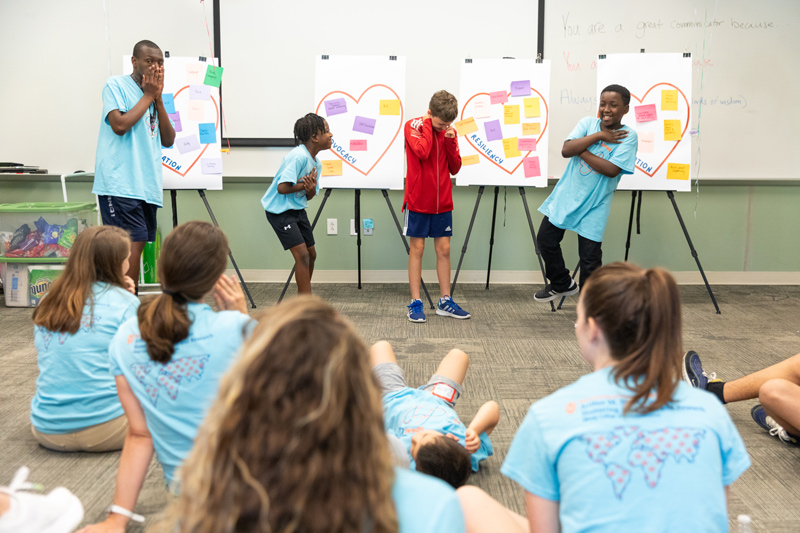 At the culmination of Camp Dream. Speak. Live., students perform in a talent show. They also showcase what they’ve learned by sharing with their parents what they want them to know about stuttering. At the culmination of Camp Dream. Speak. Live., students perform in a talent show. They also showcase what they’ve learned by sharing with their parents what they want them to know about stuttering.