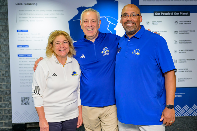 Welcoming students to campus on Friday were, from left to right, UD First Lady Eleni Assanis, President Dennis Assani and José-Luis Riera, UD’s vice president for student life.
