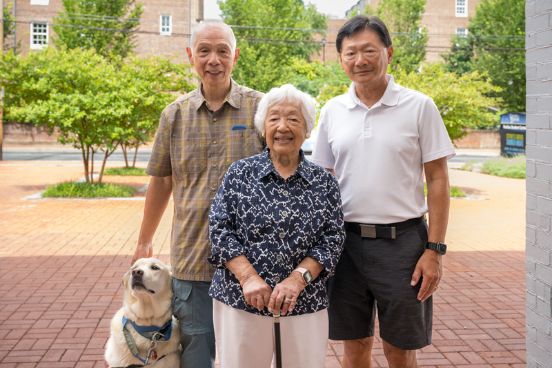  “I didn’t have much time for campus activities because I would go home to cook and care for the kids,” said Hong, pictured here with two of those “kids,” Raymond (left) and Gordon (right) Chin. All three are proud Blue Hen alumni.