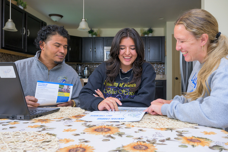 Cruz, pictured with her parents Bernardo and Rita, is the first in her family to attend a four-year university. “We're extremely proud of her and all of her accomplishments and getting into UD as a freshman,” her mom said. “It’s definitely going to be a surreal moment.” Cruz, pictured with her parents Bernardo and Rita, is the first in her family to attend a four-year university. “We're extremely proud of her and all of her accomplishments and getting into UD as a freshman,” her mom said. “It’s definitely going to be a surreal moment.”